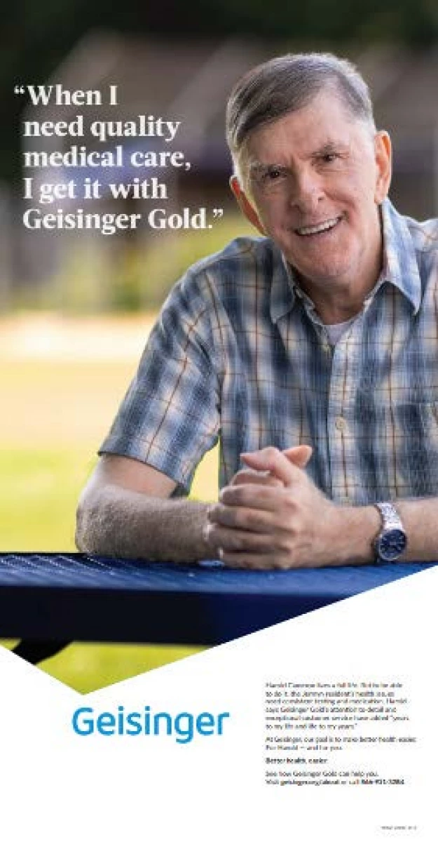 Geisinger healthcare ad with man sitting at picnic table.