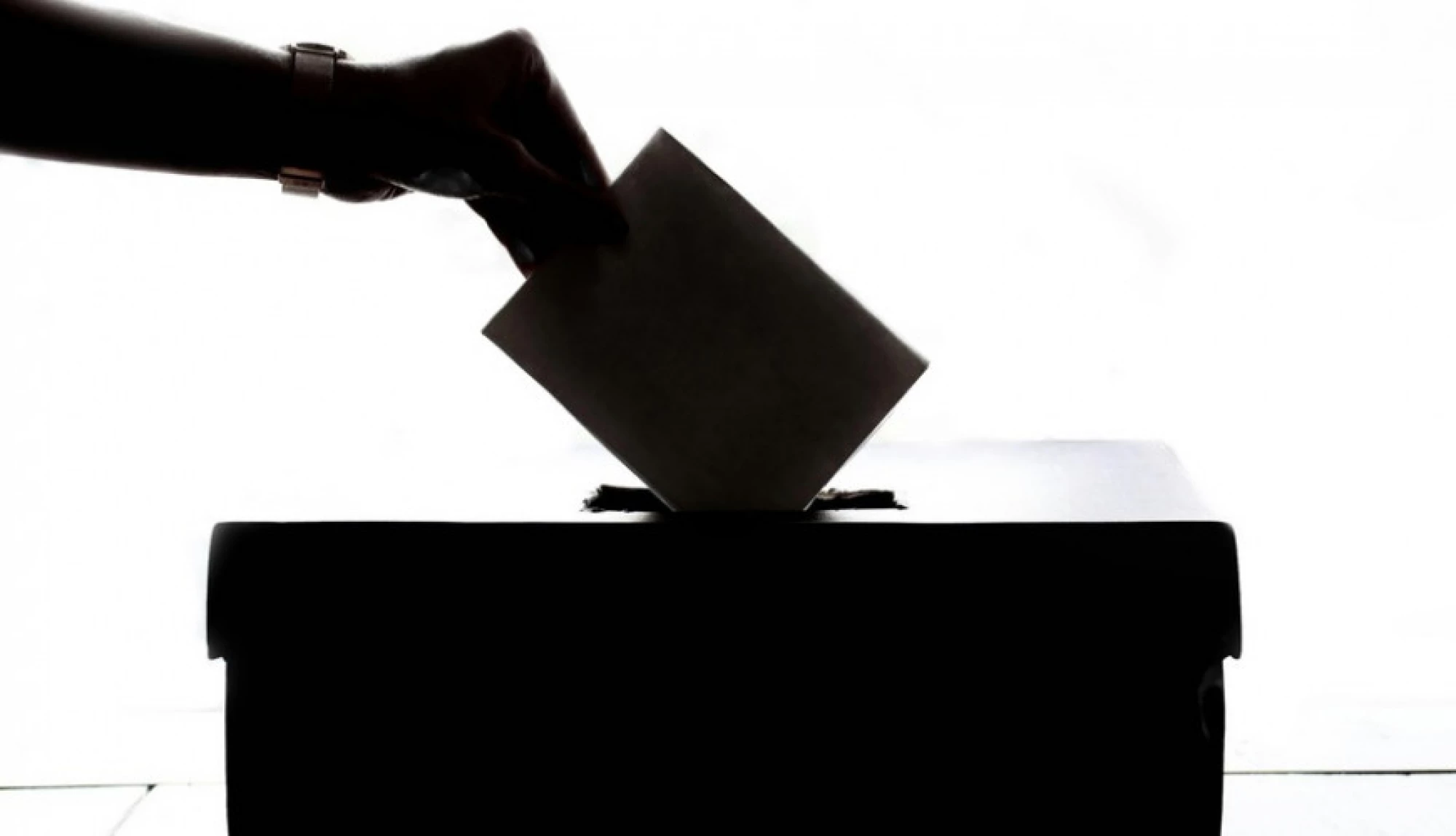 ballot going in a box
