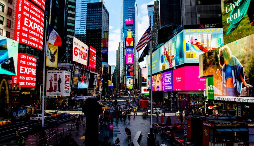 a big city with many digital billboards
