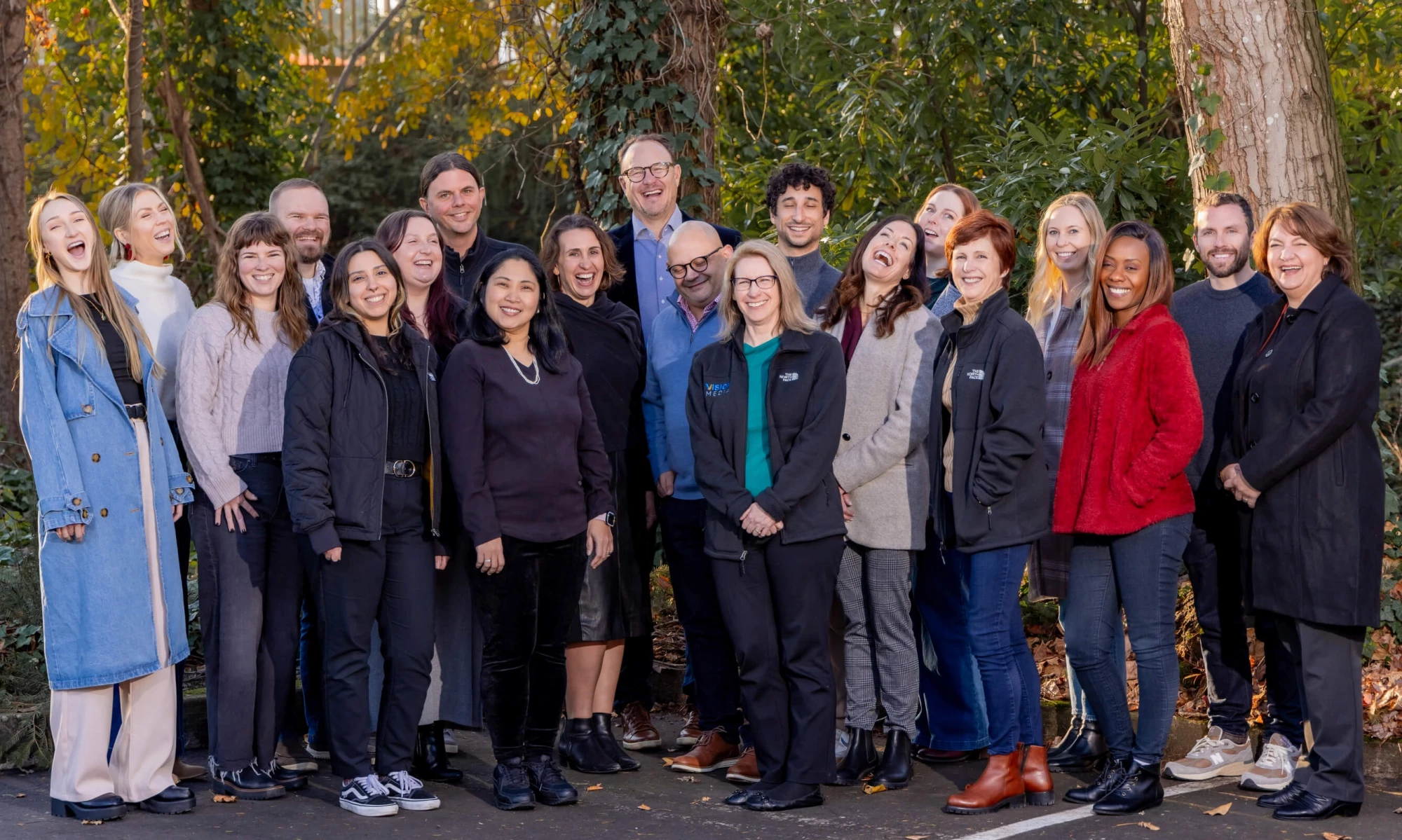 Vision Media Team Outside 2024 Laughing - Trainman Photography