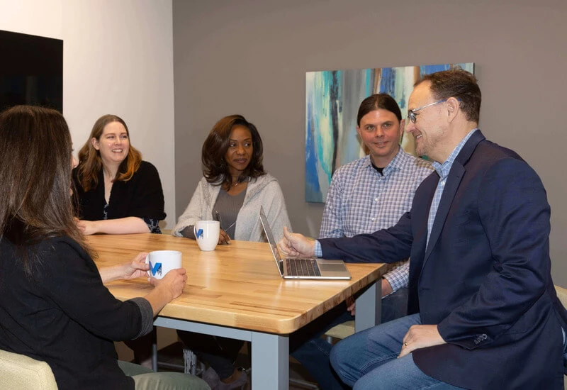 Team meeting in Giraffe conference room
