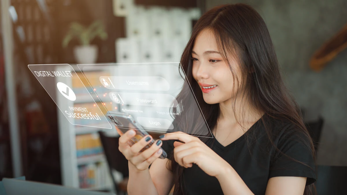 Woman logging into an account online.