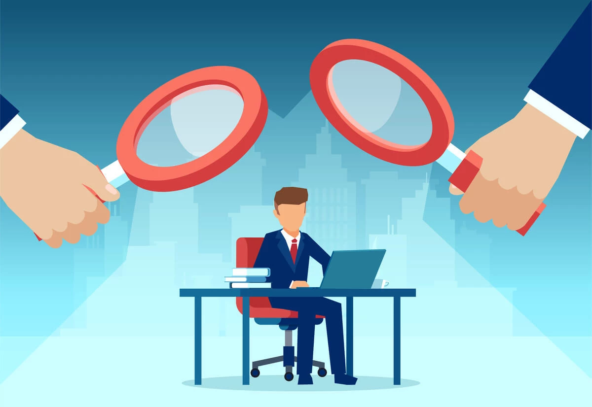 illustration to magifying glasses over person sitting at desk on computer